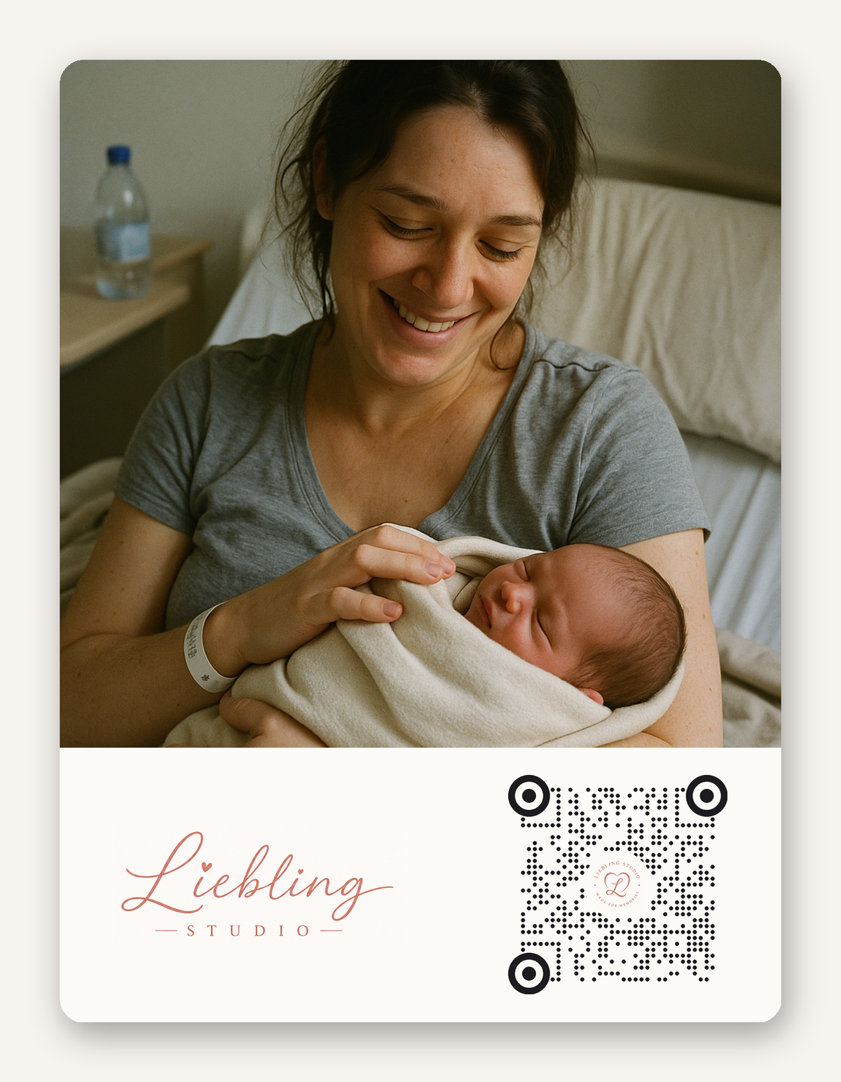 A square printed photo print featuring a smiling woman holding a newborn baby wrapped in a white swaddle, with the text 'Liebling STUDIO' and a QR code on a white lower section.